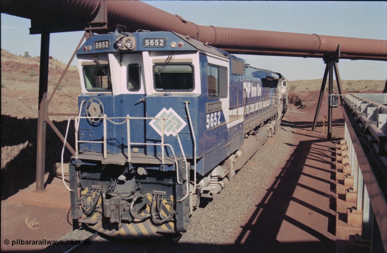 235-11
Yandi Two, BHP Iron Ore Goninan rebuild CM40-8M GE unit 5652 'Villanueva' serial 8412-09 / 93-143 arrives with the afternoon 240 waggon empty train, the hydraulic lines and dust extraction equipment frame the loco.
Keywords: 5652;Goninan;GE;CM40-8M;8412-09/93-143;rebuild;AE-Goodwin;ALCo;M636C;5482;G6061-3;