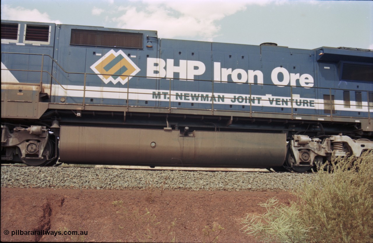 235-27
Yandi One, BHP Iron Ore Goninan rebuild CM40-8M GE unit 5654 'Kashima' serial 8412-11 / 93-145 sits on a loaded train awaiting departure time, note the much larger style fuel tank fitted to the Comeng built M636 ALCo units and also the later marigold style BHP logo.
Keywords: 5654;Goninan;GE;CM40-8M;8412-11/93-145;rebuild;Comeng-NSW;ALCo;M636C;5493;C6084-9;