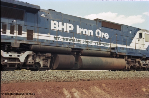 235-26
Yandi One, BHP Iron Ore Goninan rebuild CM40-8M GE unit 5639 'Corunna Downs' serial 8281-03 / 92-128 sits on a loaded train as second unit awaiting departure time. Note the fuel tank and air receiver unit that tells it was an AE Goodwin built C636 ALCo before rebuild.
Keywords: 5639;Goninan;GE;CM40-8M;8281-03/92-128;rebuild;AE-Goodwin;ALCo;C636;5459;G6027-3;