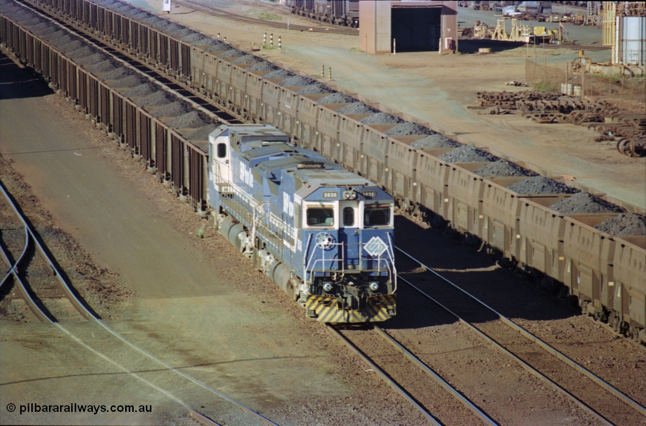 236-11
Nelson Point, Car Dumper Two delivery roads, BHP Dash 8 class locomotive 5636 'Munda', a Goninan 1991 rebuild to GE CM40-8M model, serial 8151-11 / 91-122 with a sister unit await to dump their train of Comeng style waggons, next to them is a string of Golynx style waggons.
Keywords: 5636;Goninan;GE;CM40-8M;8151-11/91-122;rebuild;AE-Goodwin;ALCo;C636;5462;G6035-3;