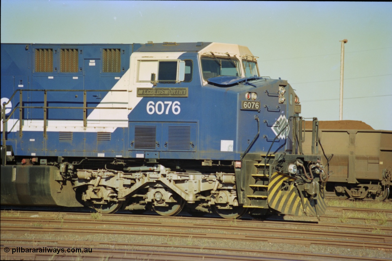 236-20
Nelson Point Loco Overhaul Shop, BHP Iron Ore's General Electric built AC6000 unit 6076 'Mt Goldsworthy' serial 51068 sits out the front with new windscreen protectors or 'blinkers' fitted.
Keywords: 6076;GE;AC6000;51068;