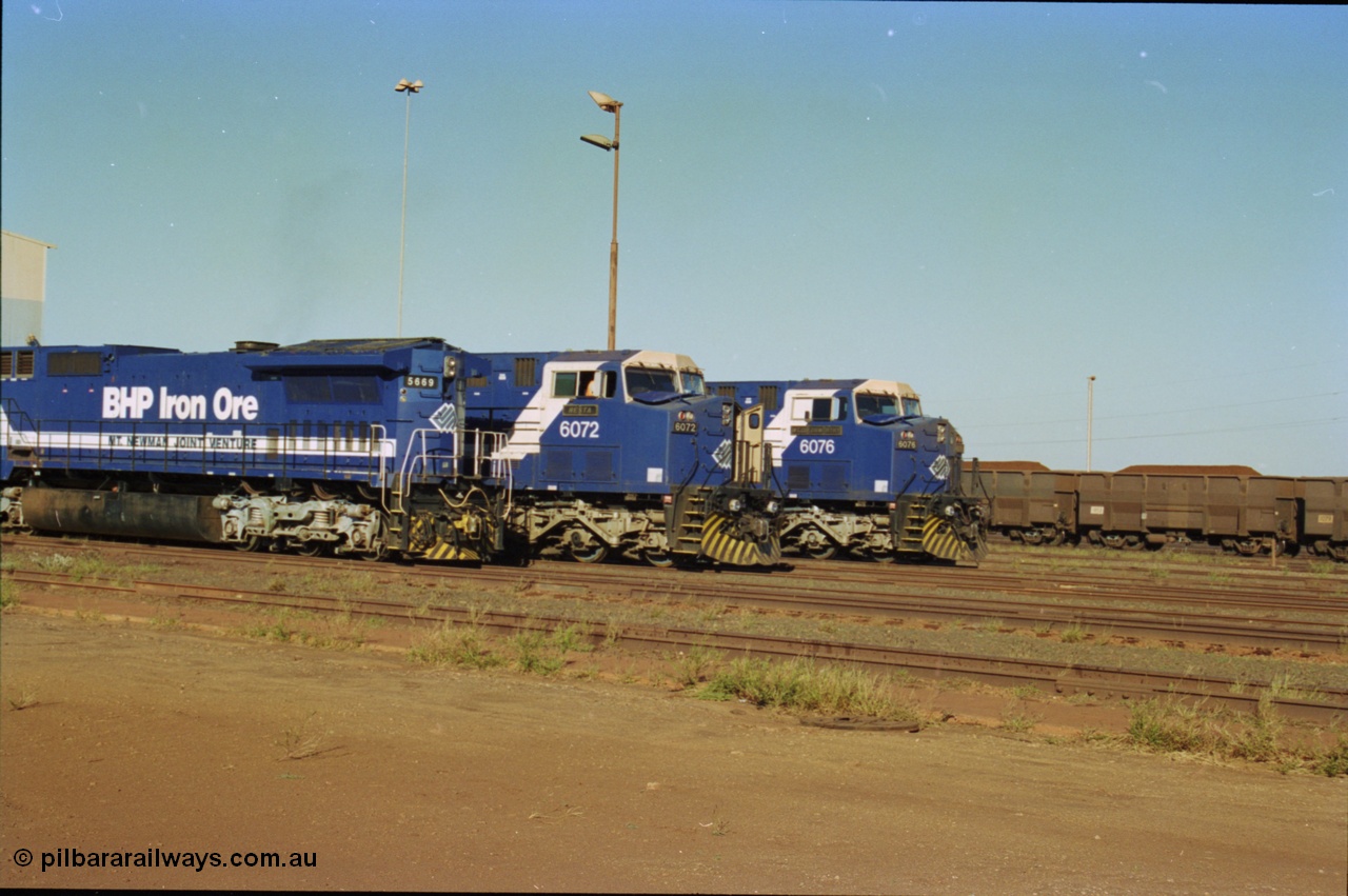 236-24
Nelson Point Loco Overhaul Shop, BHP Iron Ore's Goninan GE rebuilt CM40-8MEFI unit 5669 'Beilun' serial 8412-02 / 95-160 sits out the front awaiting attention, with AC6000 units 6072 being driven out and 6077 beside it.
Keywords: 5669;Goninan;GE;CM40-8EFI;8412-02/95-160;rebuild;Comeng-NSW;ALCo;M636C;5486;C6084-2;