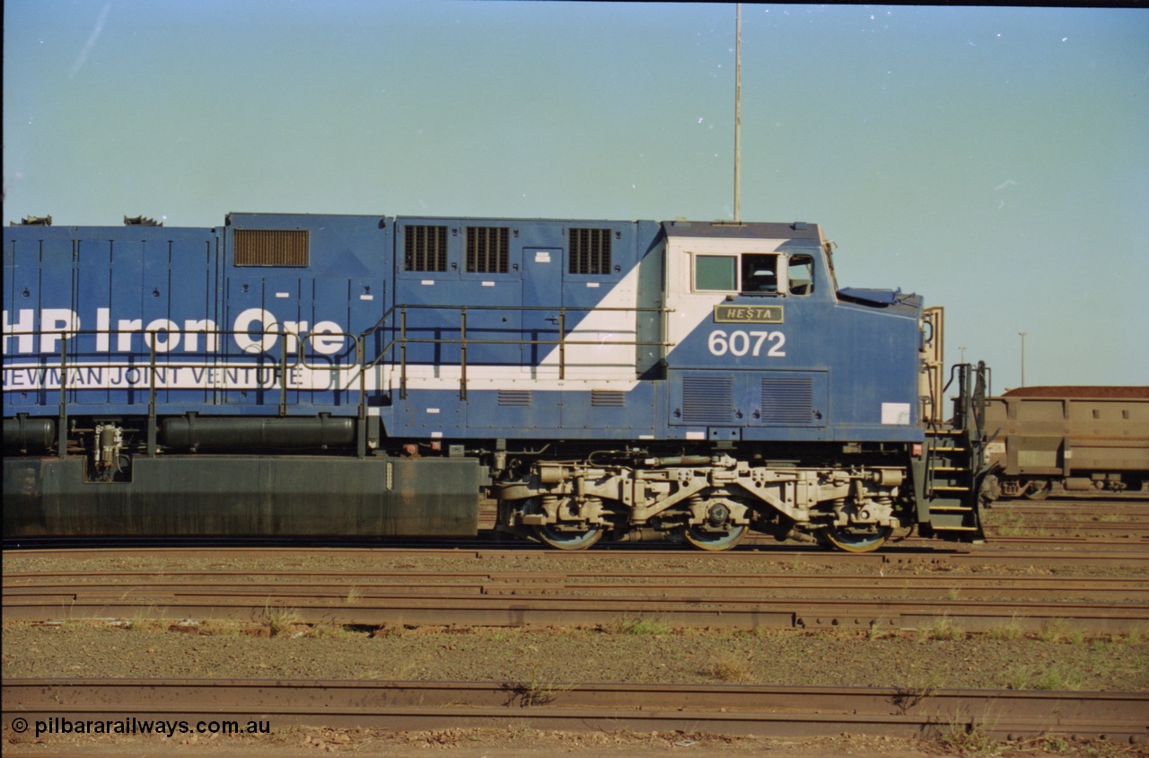 236-26
Nelson Point Loco Overhaul Shop, BHP Iron Ore's General Electric built AC6000 unit 6072 'Hesta' serial 51064 sits out the front with new windscreen protectors or 'blinkers' fitted, note cab window missing.
Keywords: 6072;GE;AC6000;51064;