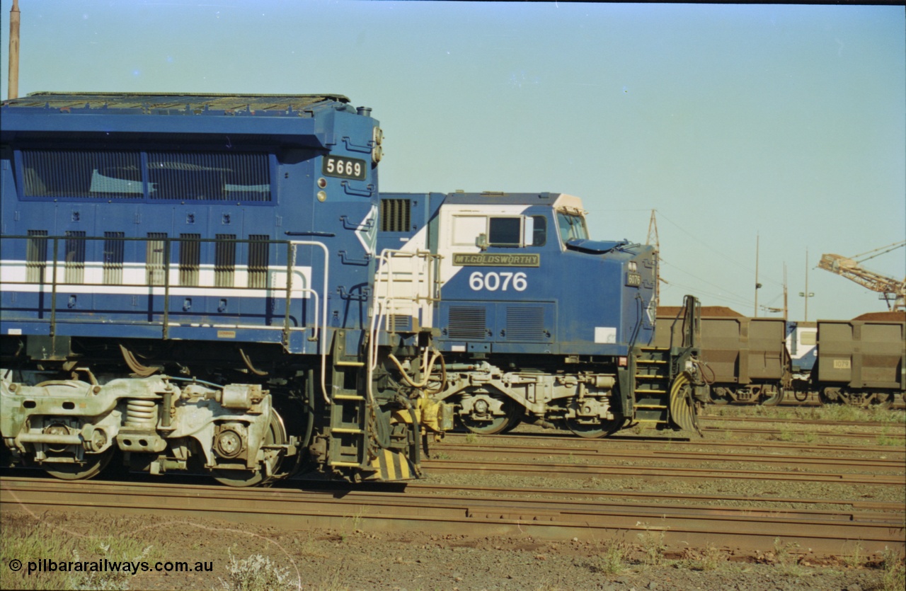 236-27
Nelson Point Loco Overhaul Shop, BHP Iron Ore's Goninan GE rebuilt CM40-8MEFI unit 5669 'Beilun' serial 8412-02 / 95-160 rear end with AC6000 unit 6076 beside it.
Keywords: 5669;Goninan;GE;CM40-8EFI;8412-02/95-160;rebuild;Comeng-NSW;ALCo;M636C;5486;C6084-2;