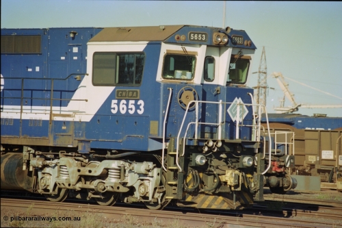 236-04
Nelson Point, Loco Overhaul Shop, BHP Dash 8 class locomotive 5653 'Chiba', a Goninan 1994 rebuild to GE CM40-8M model, serial 8412-10 / 93-144, view of drivers side of cab.
Keywords: 5653;Goninan;GE;CM40-8M;8412-10/93-144;rebuild;AE-Goodwin;ALCo;M636C;5484;G6061-5;