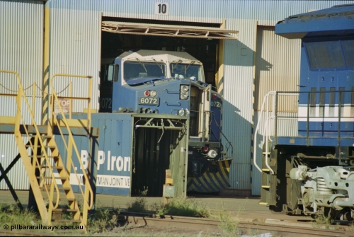 236-05
Nelson Point, Loco Overhaul Shop, BHP AC6000 class locomotive 6072 'Hesta', a General Electric built AC6000 model, serial 51064, seen here in the shed having the windscreen protectors or 'blinkers' fitted.
Keywords: 6072;GE;AC6000CW;51064;