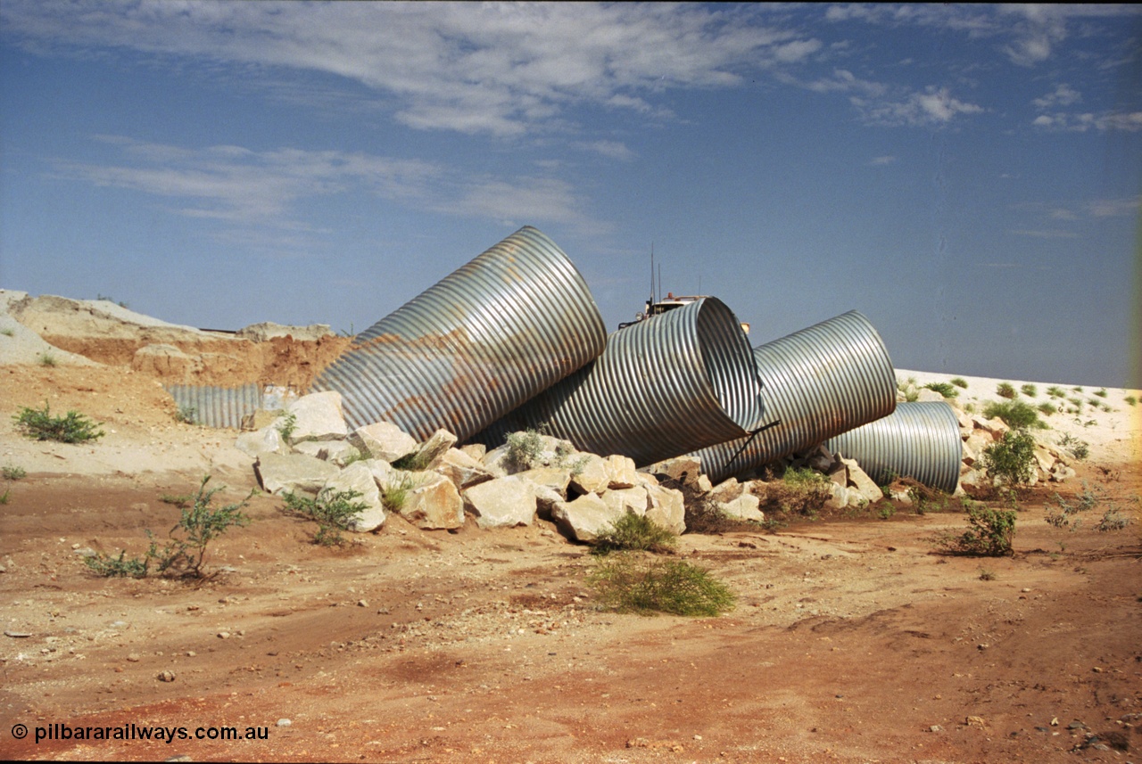 237-01
Water damaged culverts located on the upper reaches of the Edgina Creek, near the Woodstock South location on the BHP Newman line. [url=https://goo.gl/maps/kRVDYtxmRC42] Geo Data [/url].
