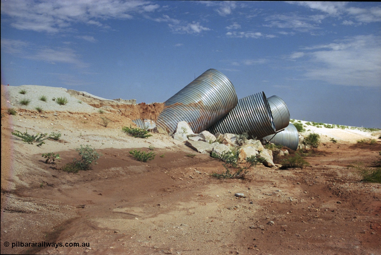 237-02
Water damaged culverts located on the upper reaches of the Edgina Creek, near the Woodstock South location on the BHP Newman line. [url=https://goo.gl/maps/kRVDYtxmRC42] Geo Data [/url].
