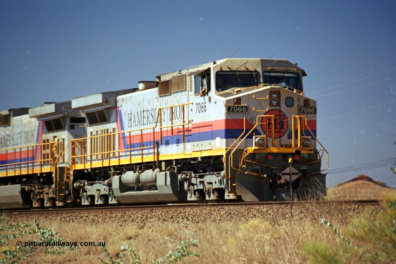 237-37
Dugite Siding, empty train in the passing track behind Hamersley Iron General Electric model Dash 9-44CW unit 7066 with serial 47745. [url=https://goo.gl/maps/6og1H2khBAu] Geodata [/url].
Keywords: 7066;Dash-9-44CW;GE;47745;