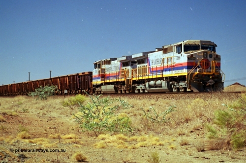 237-35
Dugite Siding, empty train in the passing track behind the standard pair of Hamersley Iron General Electric model Dash 9-44CW units 7066 serial 47745 and 7076 serial 47755. [url=https://goo.gl/maps/6og1H2khBAu] Geodata [/url].
Keywords: 7066;GE;Dash-9-44CW;47745;