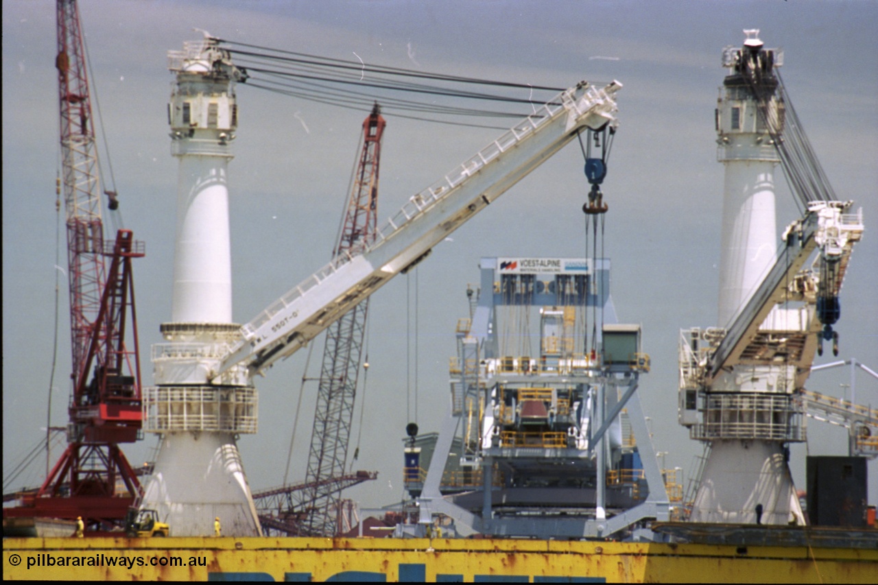 238-08
Port Hedland Harbour, heavy lift ship Happy Buccaneer (IMO: 8300389) sits at Finucane Island D Berth delivering a new shiploader for BHP Billiton. 1st November 2003. [url=https://goo.gl/maps/vWZoHTsRPsp] Geodata [/url]. Back in time here the ship cranes were only 550 tonne each, these are now 700.
Keywords: Happy-Buccaneer;Hitachi-Shipbuilding-Osaka-Japan;