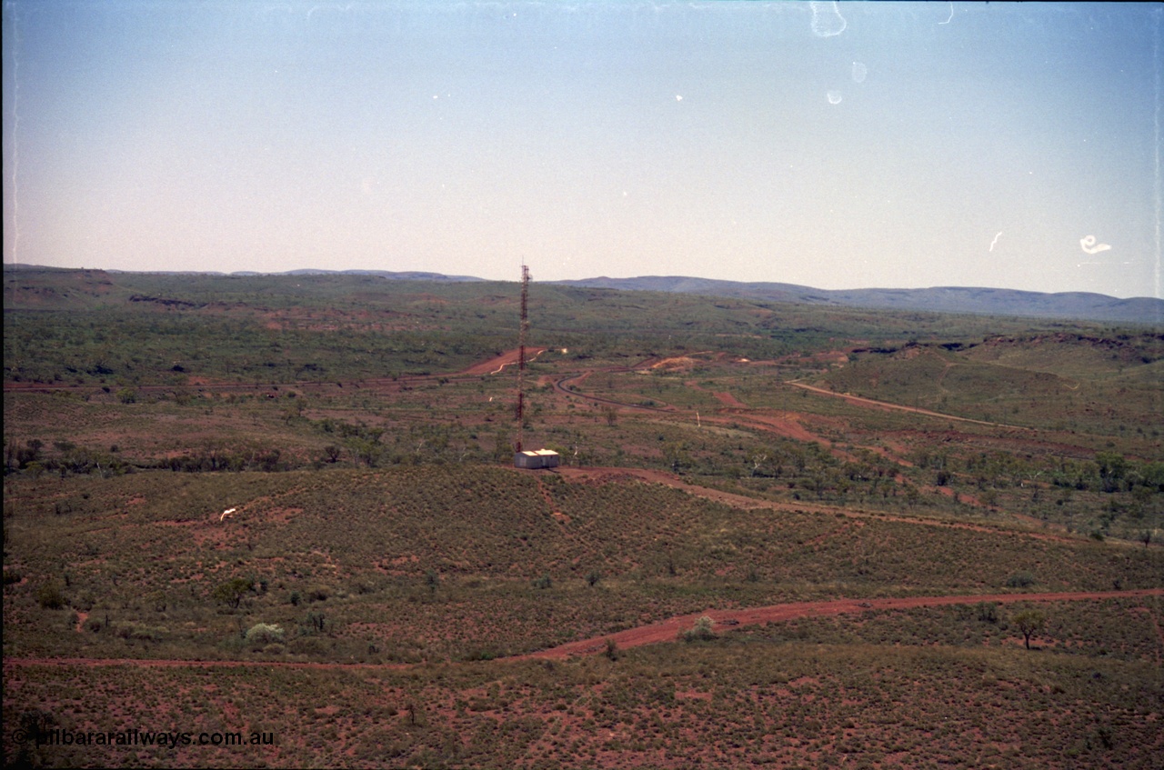 239-06
View from the radial stacker at Yandi One looking north at the Yandi Repeater for the rail communication system. [url=https://goo.gl/maps/hApNXoLtbtQ2]GeoData[/url].
