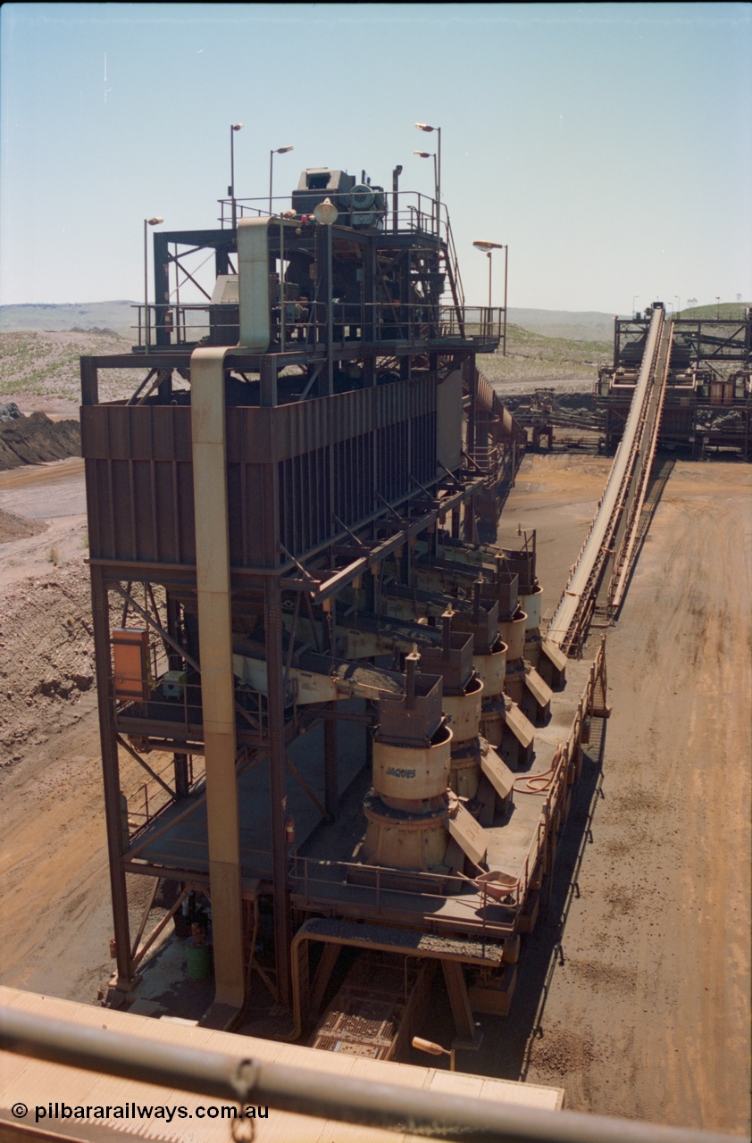 239-17
View of Yandi One OHP looking from the secondary crusher north west back at the 'new side' of tertiary crushers. The screen house can be seen in the background. [url=https://goo.gl/maps/gpgfApaAJYt]GeoData[/url].
