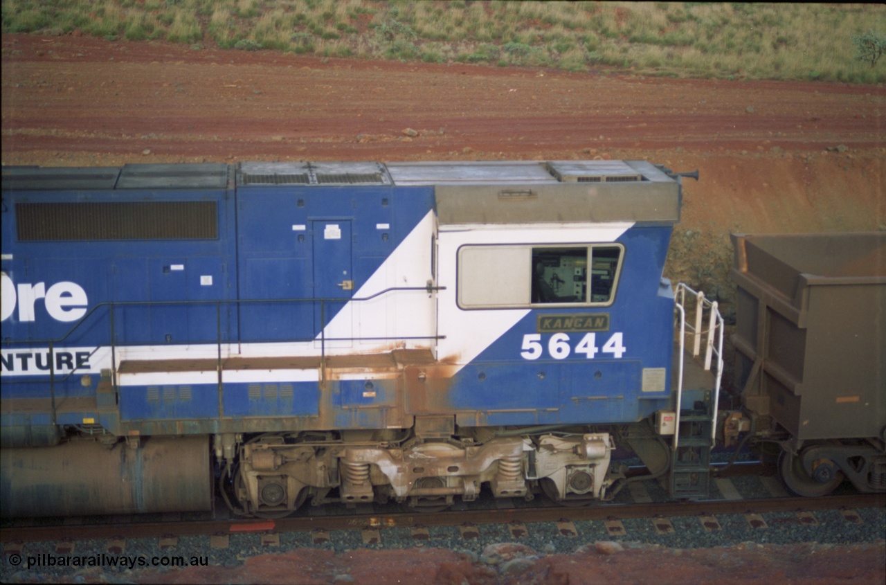 239-35
Yandi Two, cab side shot of Goninan Dash 8 unit CM40-8M 5644 'Kangan' serial 8281-09/92-133, rebuilt from AE Goodwin built ALCo M636 5471 serial G6047-3 still with ALCo Hi-Ad bogies.
