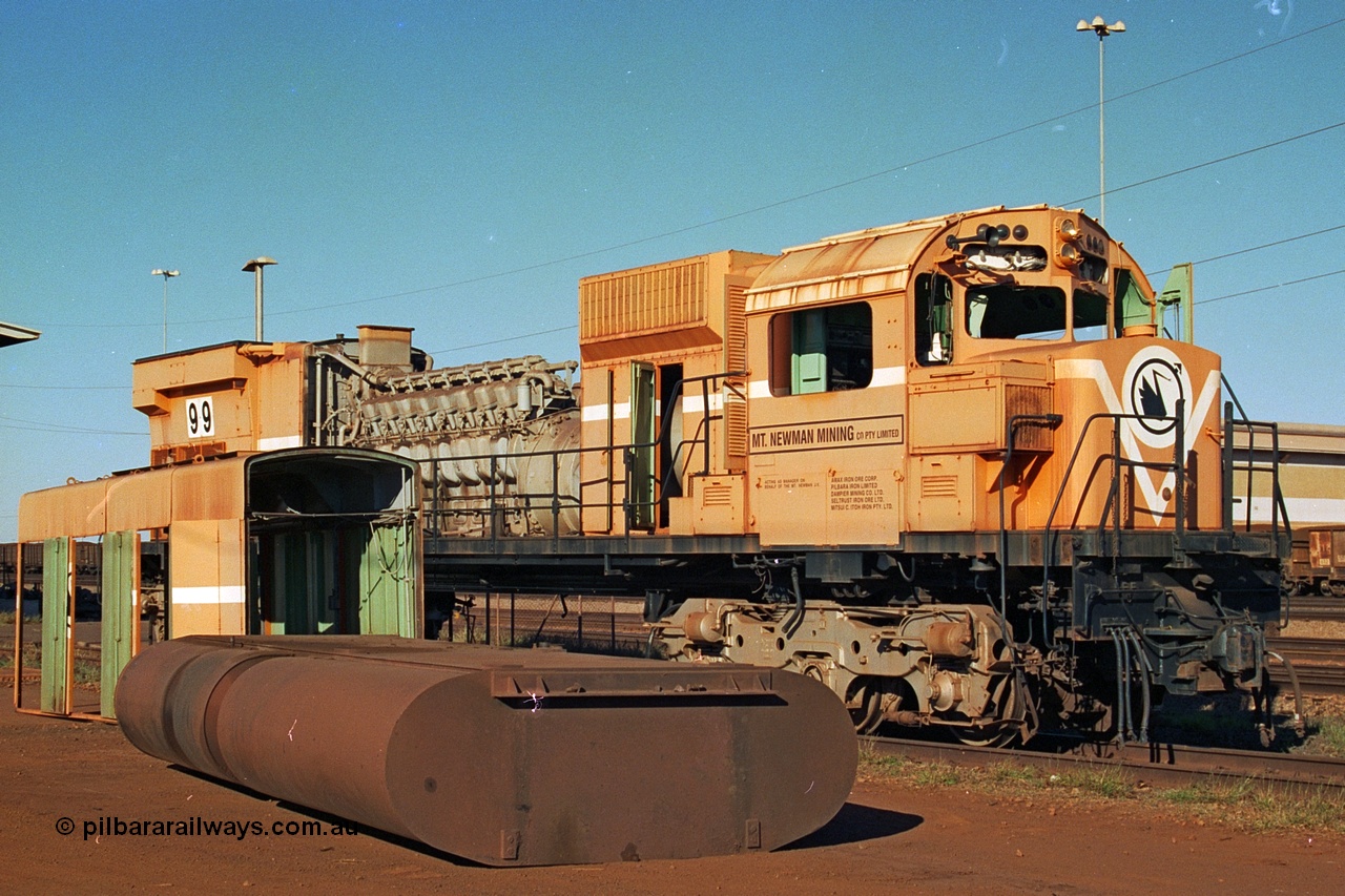 240-02
Nelson Point, retired Mt Newman Mining Comeng NSW built ALCo M636 unit 5499 serial C6096-4 sits awaiting its engine removal prior to being sent by road to Rail Heritage WA's Museum at Bassendean, Perth for preservation. 25th June 2002.
Keywords: 5499;Comeng-NSW;ALCo;M636;C6096-4;