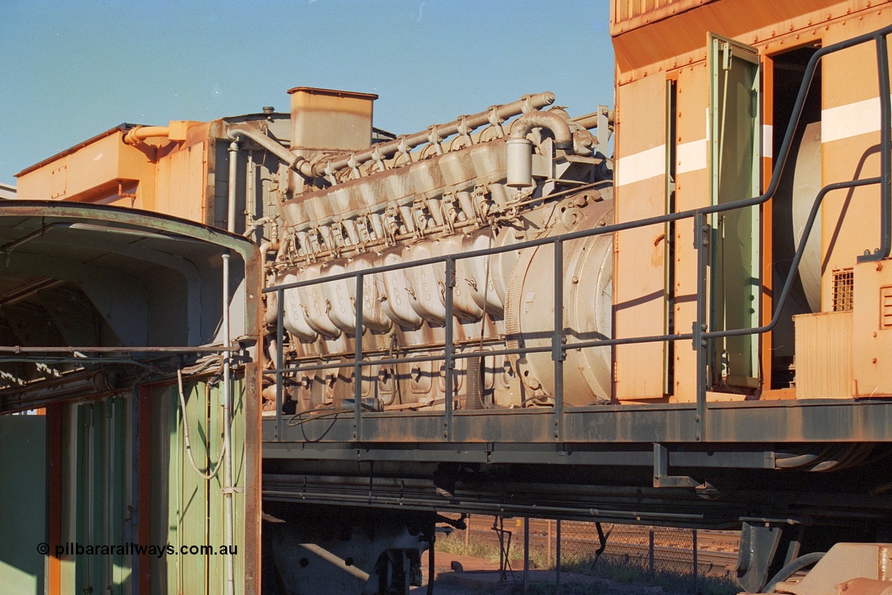 240-07
Nelson Point, retired Mt Newman Mining Comeng NSW built ALCo M636 unit 5499 serial C6096-4 sits with the hood removed exposing the ALCo 251F engine prior to removal and being sent by road to Rail Heritage WA's Bassendean museum for preservation. 25th June 2002.
Keywords: 5499;Comeng-NSW;ALCo;M636;C6096-4;251F;