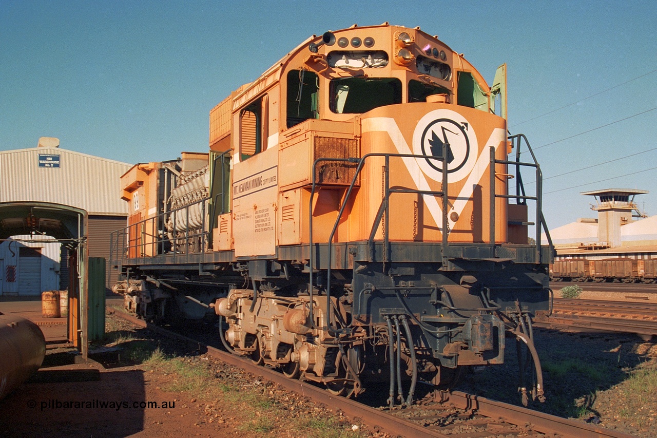 240-09
Nelson Point, retired Mt Newman Mining Comeng NSW built ALCo M636 unit 5499 serial C6096-4 sits awaiting its engine removal prior to being sent by road to Rail Heritage WA's Museum at Bassendean, Perth for preservation. 25th June 2002.
Keywords: 5499;Comeng-NSW;ALCo;M636;C6096-4;