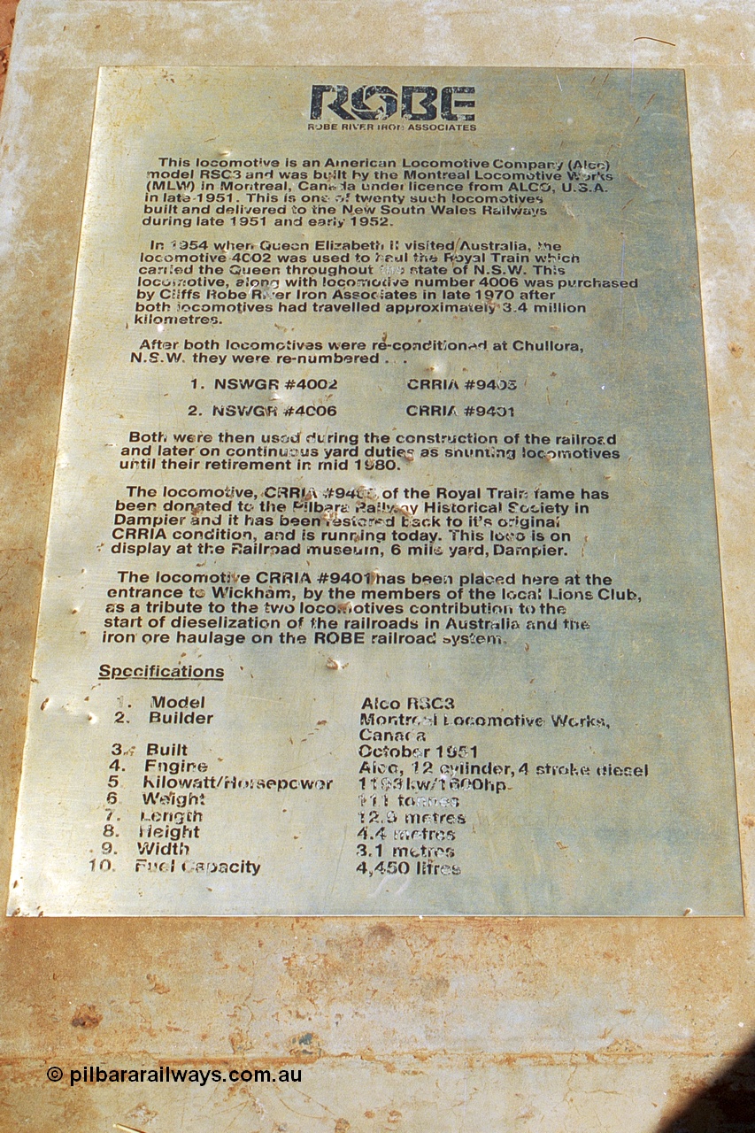 240-12
Wickham town entry statement, concrete plinth with plaque outlining the history of the MLW built ALCo model RSC3 units operated by Robe River prior to preservation. 31st August 2002.
