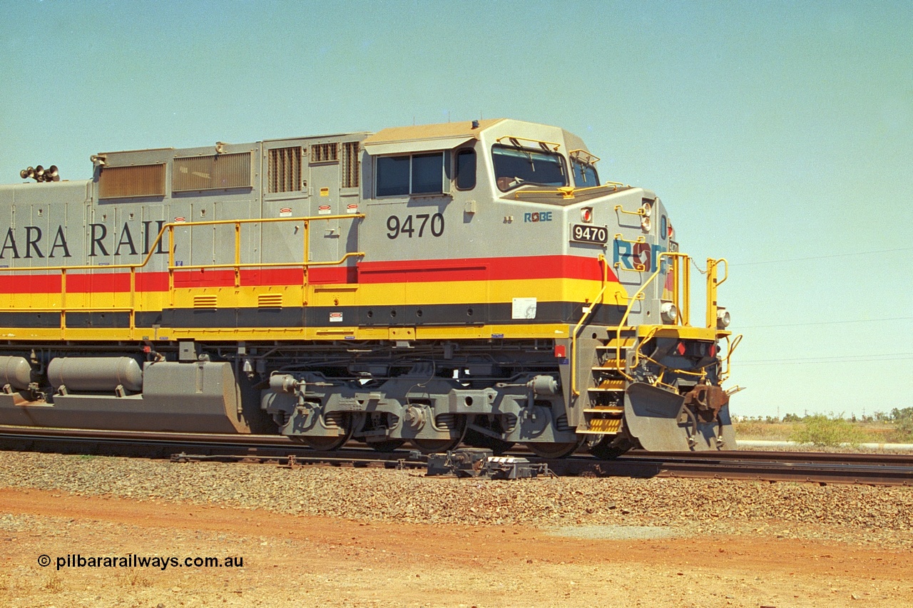 240-30
Seven Mile, Pilbara Rail, Robe River owned, General Electric built Dash 9-44CW unit 9470 serial 53455. This and sister units 9471 and 9472 were the first painted in the Pilbara Rail livery. 31st August 2002.
Keywords: 9470;GE;Dash-9-44CW;53455;