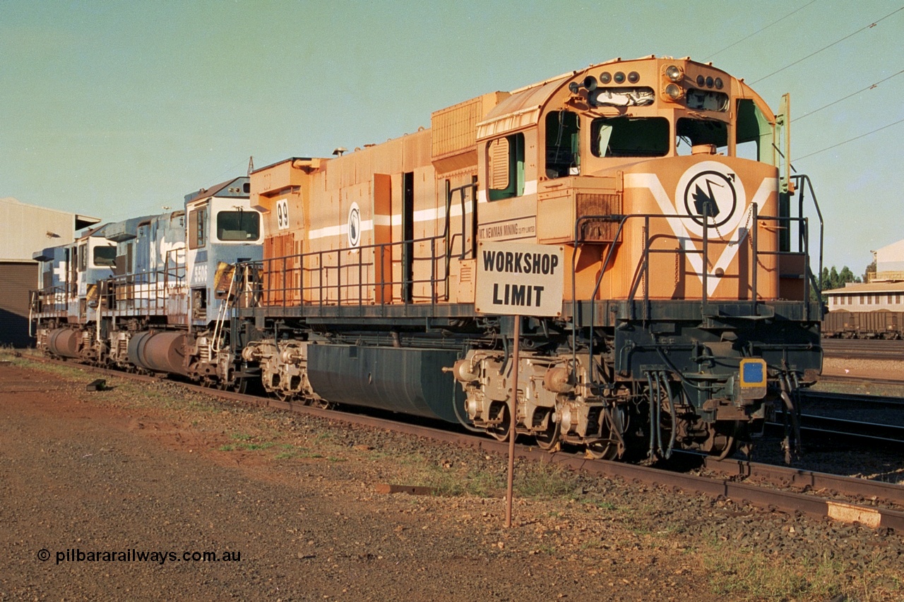 241-03
Nelson Point, Mt Newman Mining's last in-service ALCo M636 unit 5499 serial C6096-4 built by Comeng NSW sits awaiting partial dismantling before being sent by road to Rail Heritage WA's museum at Bassendean, Perth for preservation. June 2002.
Keywords: 5499;Comeng-NSW;ALCo;M636;C6096-4;