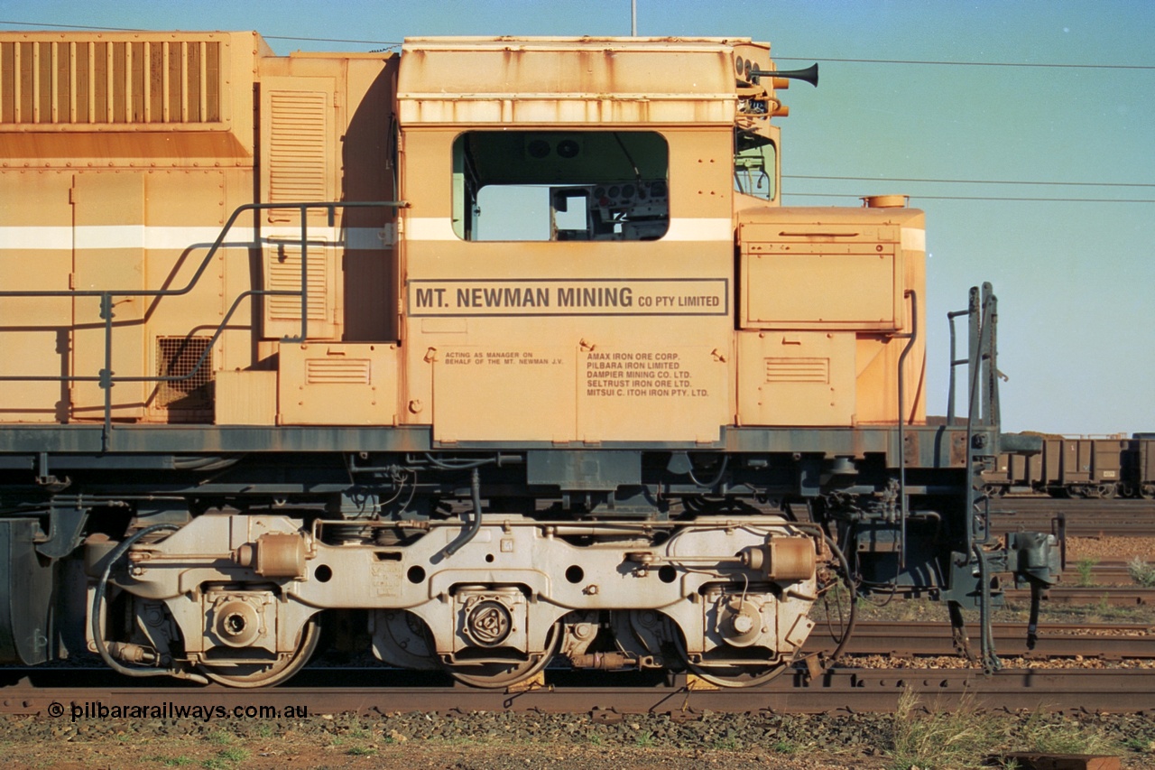 241-07
Nelson Point, Mt Newman Mining's last in-service ALCo M636 unit 5499 serial C6096-4 built by Comeng NSW sits awaiting partial dismantling before being sent by road to Rail Heritage WA's museum at Bassendean, Perth for preservation, cab side view. June 2002.
Keywords: 5499;Comeng-NSW;ALCo;M636;C6096-4;