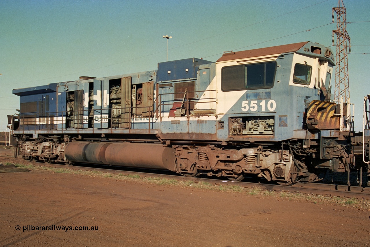 241-09
Nelson Point, Goninan GE rebuild C36-7M unit 5510 is in the process of being removed from site bound for Asset Kinetics in Maddington, Perth. This image shows the Dash 8 radiator frame fitted to 5510 following collision repairs. June 2002.
Keywords: 5510;Goninan;GE;C36-7M;4839-07/87-075;rebuild;AE-Goodwin;ALCO;C636;5458;G6027-2;