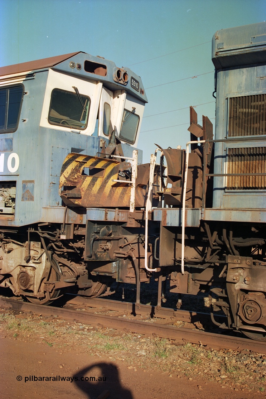 241-17
Nelson Point, Goninan GE rebuild C36-7M unit 5510 serial 4839-07 / 87-075 is in the process of being removed from site bound for Asset Kinetics in Maddington, Perth. Drivers side cab front view with plough removed. June 2002.
Keywords: 5510;Goninan;GE;C36-7M;4839-07/87-075;rebuild;AE-Goodwin;ALCO;C636;5458;G6027-2;