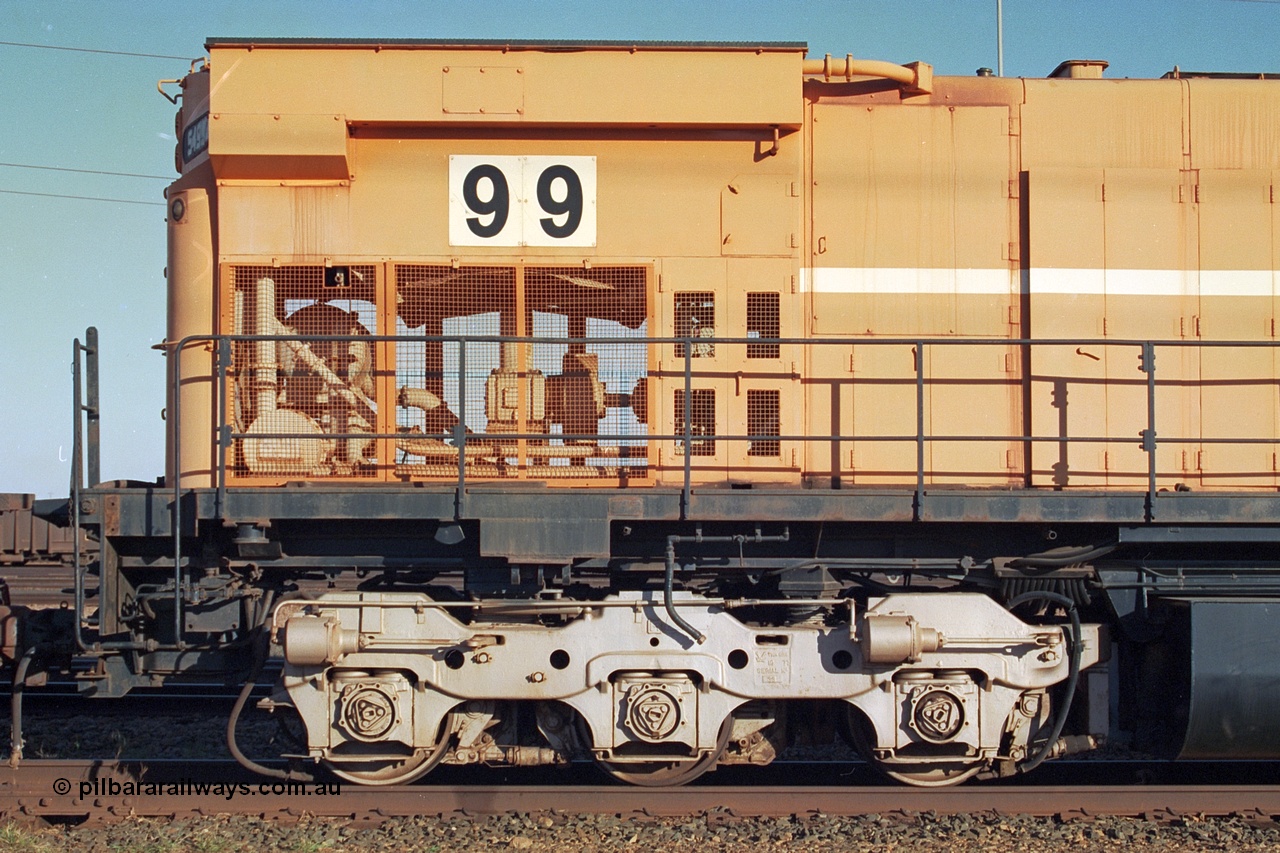 241-20
Nelson Point, Mt Newman Mining's last in-service ALCo M636 unit 5499 serial C6096-4 built by Comeng NSW sits awaiting partial dismantling before being sent by road to Rail Heritage WA's museum at Bassendean, Perth for preservation. Drivers side view of the radiator section. June 2002.
Keywords: 5499;Comeng-NSW;ALCo;M636;C6096-4;