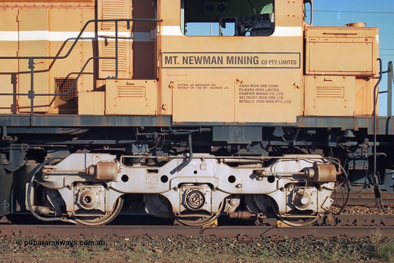 241-23
Nelson Point, Mt Newman Mining's last in-service ALCo M636 unit 5499 serial C6096-4 built by Comeng NSW sits awaiting partial dismantling before being sent by road to Rail Heritage WA's museum at Bassendean, Perth for preservation. Drivers side cab view. June 2002.
Keywords: 5499;Comeng-NSW;MLW-ALCo;M636;C6096-4;