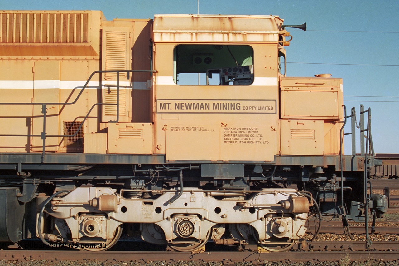 241-24
Nelson Point, Mt Newman Mining's last in-service ALCo M636 unit 5499 serial C6096-4 built by Comeng NSW sits awaiting partial dismantling before being sent by road to Rail Heritage WA's museum at Bassendean, Perth for preservation with two C36-7M units 5506 and 5510 also awaiting removal from site. June 2002.
Keywords: 5499;Comeng-NSW;ALCo;M636;C6096-4;