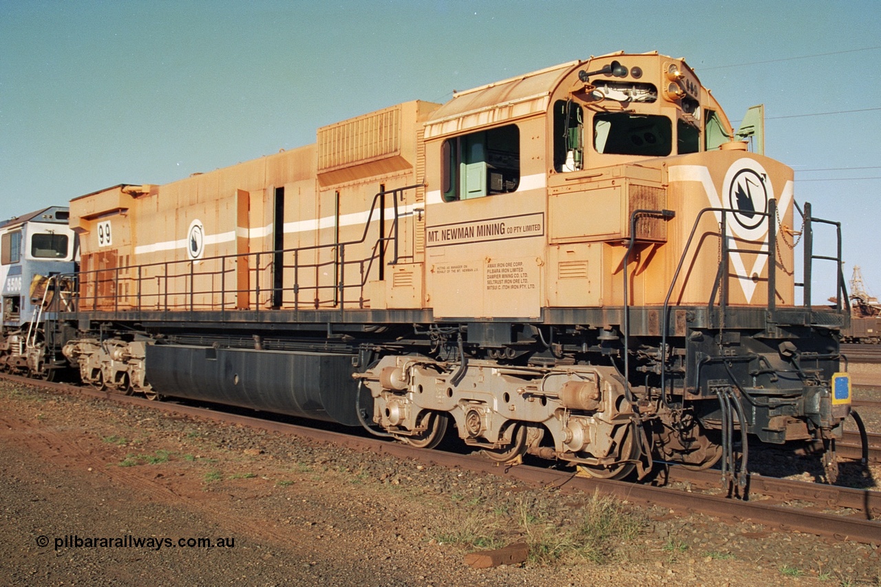 241-25
Nelson Point, Mt Newman Mining's last in-service ALCo M636 unit 5499 serial C6096-4 built by Comeng NSW sits awaiting partial dismantling before being sent by road to Rail Heritage WA's museum at Bassendean, Perth for preservation. June 2002.
Keywords: 5499;Comeng-NSW;MLW-ALCo;M636;C6096-4;