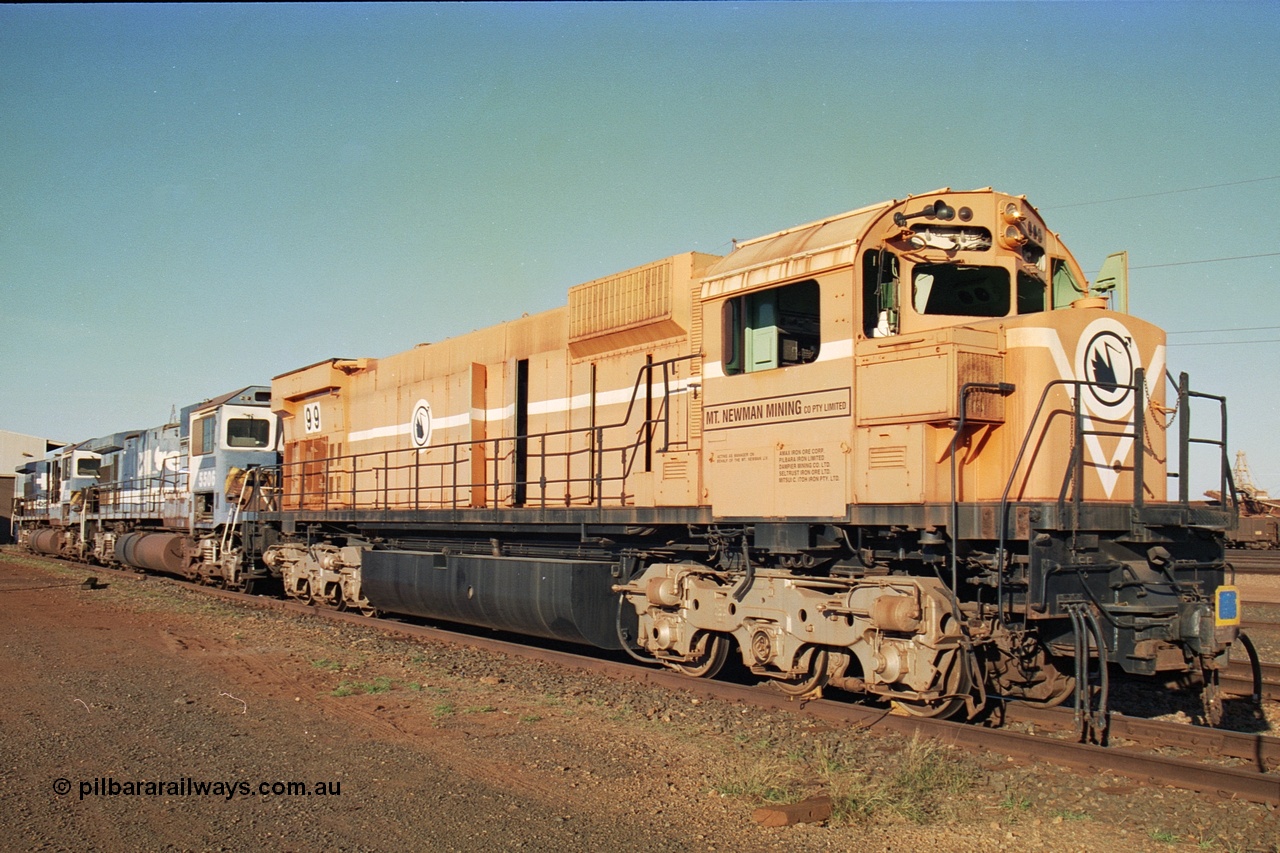 241-26
Nelson Point, Mt Newman Mining's last in-service ALCo M636 unit 5499 serial C6096-4 built by Comeng NSW sits awaiting partial dismantling before being sent by road to Rail Heritage WA's museum at Bassendean, Perth for preservation with two C36-7M units 5506 and 5510 also awaiting removal from site. June 2002.
Keywords: 5499;Comeng-NSW;MLW-ALCo;M636;C6096-4;