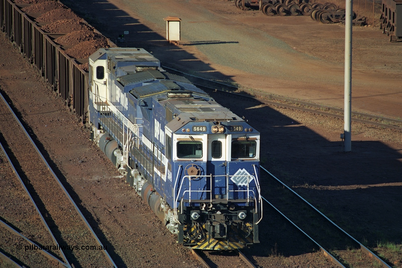 241-31
Nelson Point, Car Dumper 2 holding roads, a pair of CM40-8M units 5649 'Pohang' and 5640 'Ethel Creek' wait their turn through the dumper to discharge. June 2002.
Keywords: 5649;Goninan;GE;CM40-8M;8412-07/93-140;rebuild;AE-Goodwin;ALCo;M636C;5473;G6047-5;