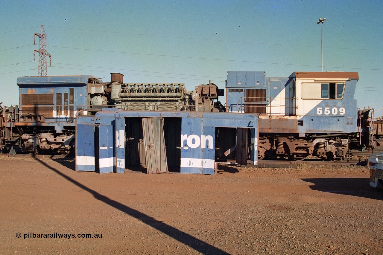 242-05
Nelson Point, BHP Goninan GE rebuild C36-7M unit 5509 serial 4839-05 / 87-074 about to be trucked to United Goninan Perth for eventual cutting down to the frame and heading to United Goninan Broadmeadow NSW as an engine test bed. May 2002.
Keywords: 5509;Goninan;GE;C36-7M;4839-05/87-074;rebuild;AE-Goodwin;ALCo;C636;5452;G6012-1;