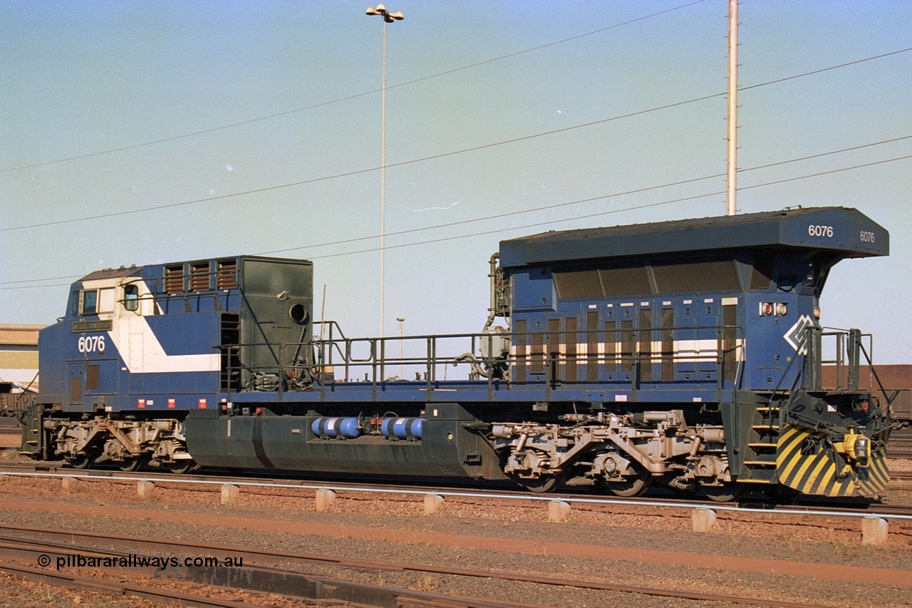 242-10
Nelson Point, Loco Overhaul Shop, General Electric built AC6000 locomotive 6076 'Mt Goldsworthy' serial 51068 with engine and alternator removed. May 2002.
Keywords: 6076;GE;AC6000;51068;