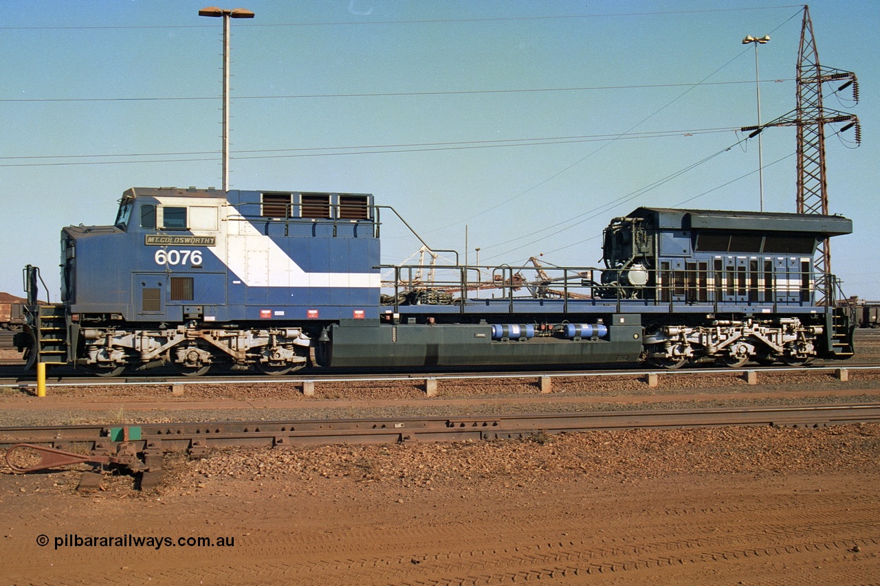 242-12
Nelson Point, Loco Overhaul Shop, General Electric built AC6000 locomotive 6076 'Mt Goldsworthy' serial 51068 with engine and alternator removed. May 2002.
Keywords: 6076;GE;AC6000;51068;