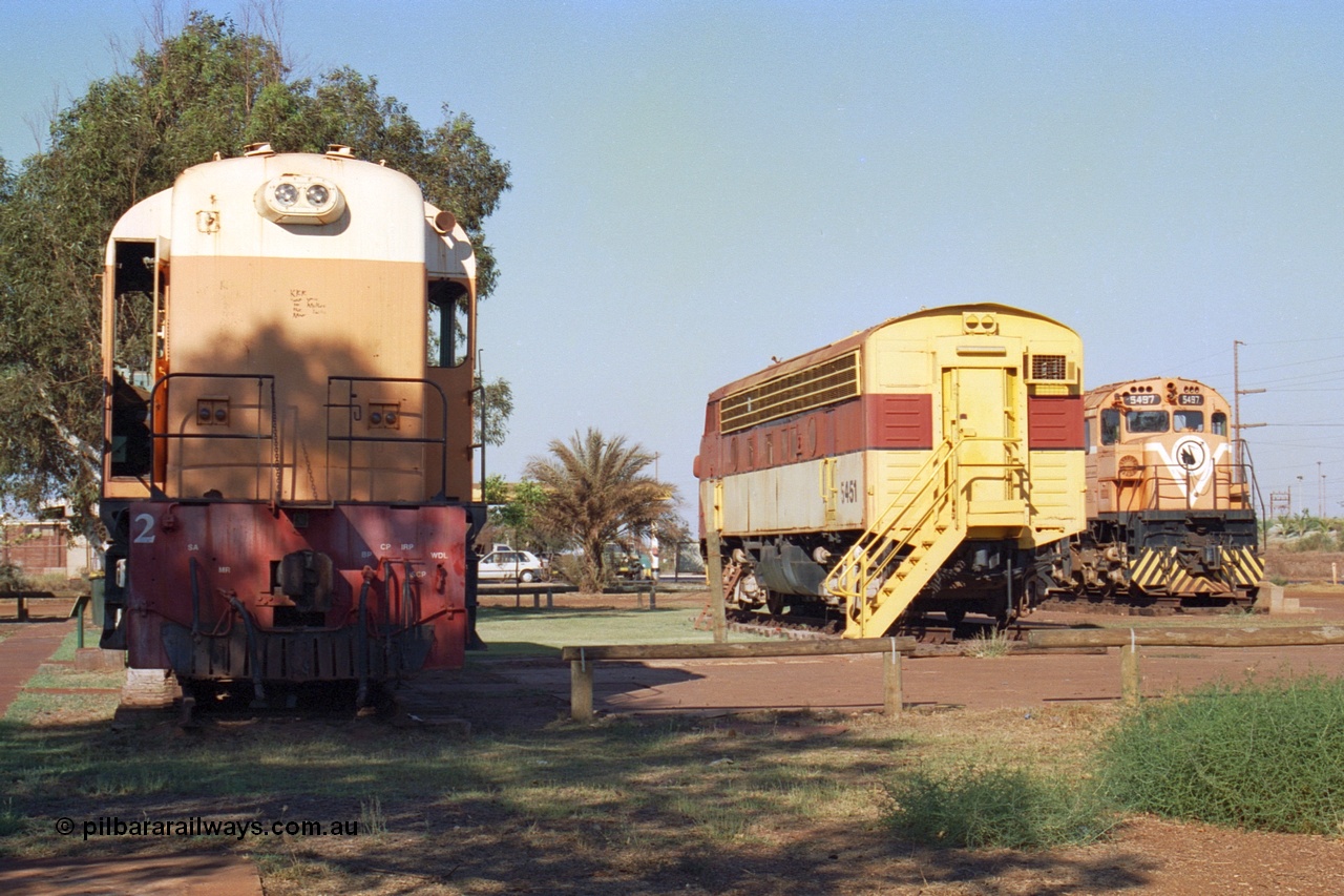 242-27
Port Hedland, Don Rhodes Mining Museum, preserved locomotives from the early days of the Port Hedland iron ore miners of Goldsworthy Mining and Mt Newman Mining. From left is a Goldsworthy Mining B class unit #2 built by English Electric serial number A-105, Mt Newman Mining 5451 which was built by EMD as an F7A model and started life with Western Pacific in the USA and Mt Newman Mining 5497, a Comeng NSW built M636 ALCo unit. May 2002.
