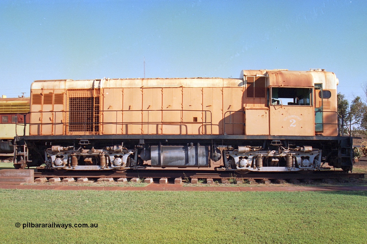242-29
Port Hedland, Don Rhodes Mining Museum, preserved Goldsworthy Mining B class unit #2 serial number A-105, these units of Bo-Bo design with a 6CSRKT 640 kW prime mover were built at the English Electric Rocklea Qld plant in 1965 and primarily used for the construction of the Mt Goldsworthy to Finucane Island railway. May 2002.
Keywords: B-class;English-Electric-Qld;ST95B;A-105;GML;Goldsworthy-Mining;
