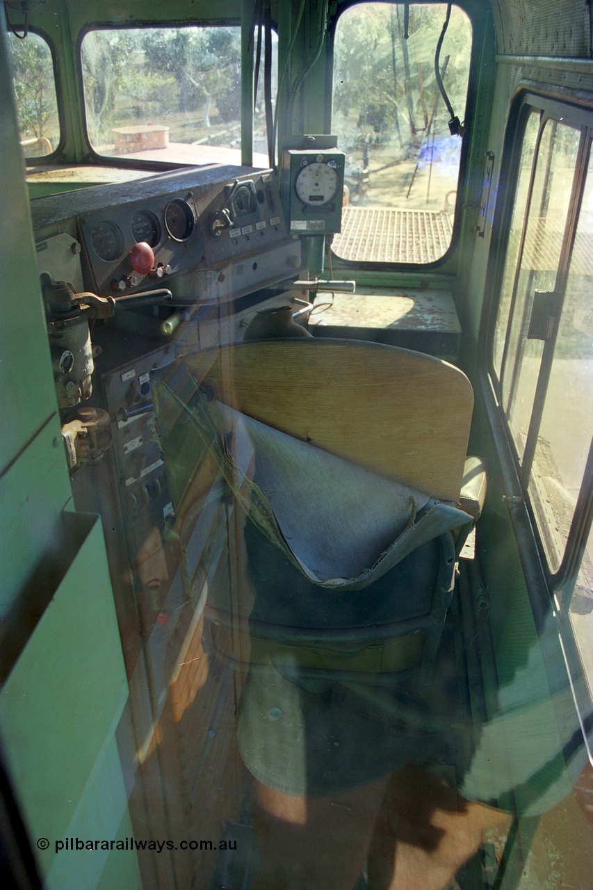 242-30
Port Hedland, Don Rhodes Mining Museum, preserved Mt Newman Mining Comeng NSW built ALCo M636 unit 5497 serial C6096-2, view looking into driving cab. May 2002.
Keywords: 5497;Comeng-NSW;ALCo;M636;C6096-2;