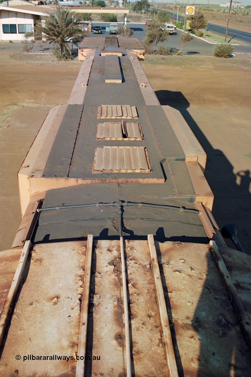 242-32
Port Hedland, Don Rhodes Mining Museum, preserved Mt Newman Mining Comeng NSW built ALCo M636 unit 5497 serial C6096-2, view of roof. May 2002.
Keywords: 5497;Comeng-NSW;ALCo;M636;C6096-2;