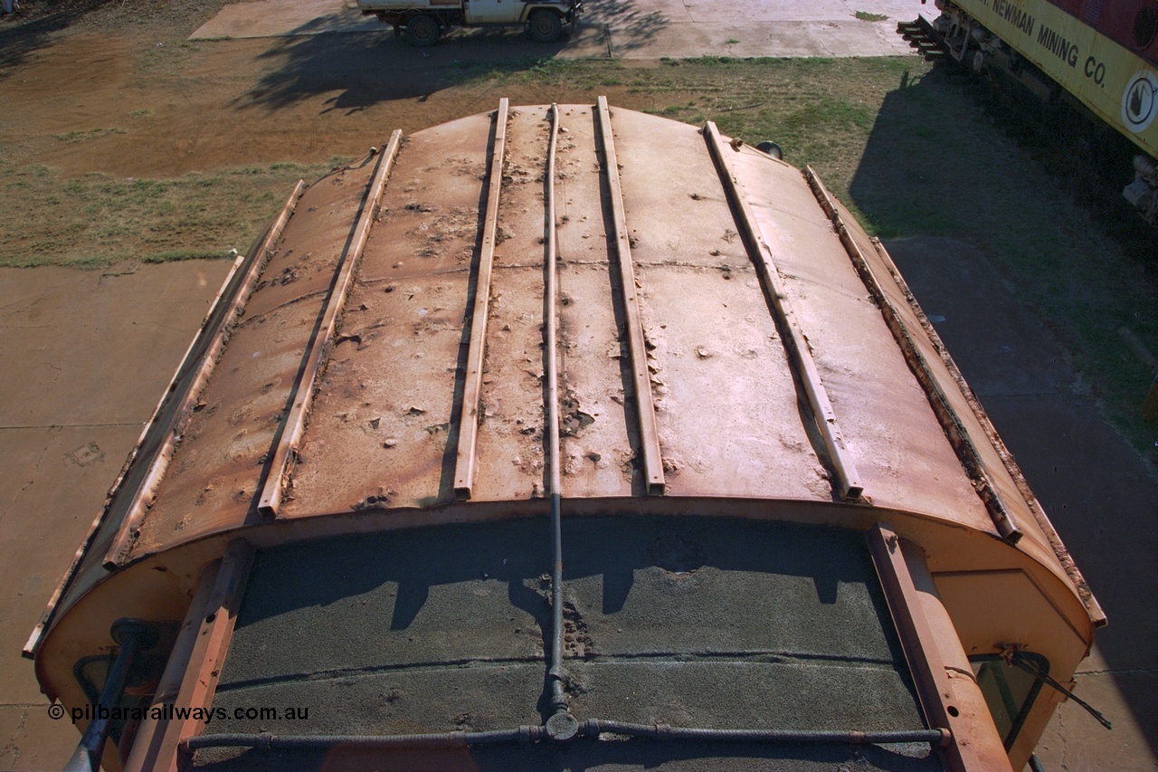 242-33
Port Hedland, Don Rhodes Mining Museum, preserved Mt Newman Mining Comeng NSW built ALCo M636 unit 5497 serial C6096-2, view of cab roof. May 2002.
Keywords: 5497;Comeng-NSW;MLW-ALCo;M636;C6096-2;