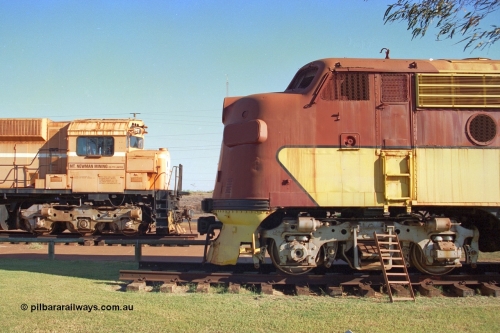 242-35
Port Hedland, Don Rhodes Mining Museum, a view across the nose of former Western Pacific F7A unit 923A built by EMD in June 1951 with serial number 10805 and frame number 3040-A3, this unit was purchased by Bechtel in 1967 for use in building the Mt Newman Mining's Port Hedland to Newman railway, with M636 ALCo unit 5497 in the background. May 2002.
Keywords: 5451;EMD;F7A;10805;923A;3040-A3;