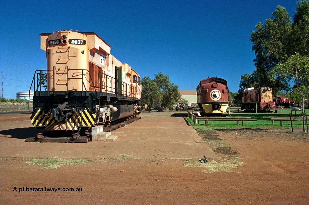 243-03
Port Hedland, Don Rhodes Mining Museum, preserved locomotives from the early days of the Port Hedland iron ore miners of Goldsworthy Mining and Mt Newman Mining. From left is Mt Newman Mining 5497, a Comeng NSW built M636 ALCo unit, Mt Newman Mining 5451 which was built by EMD as an F7A model and started life with Western Pacific in the USA and Goldsworthy Mining B class unit #2 built by English Electric serial number A-105. August 2003.
Keywords: 5497;Comeng-NSW;MLW-ALCo;M636;C6096-2;