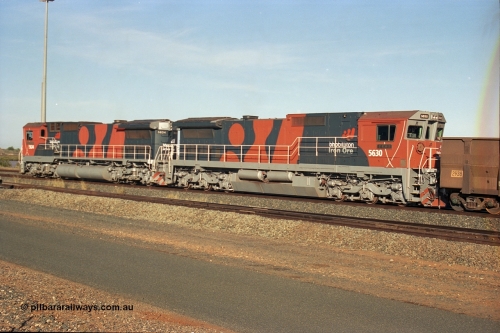 243-09
Nelson Point departure yard, BHP Billiton's CM39-8 unit 5630 'Zeus' serial 5831-09 / 88-079 and built new by Goninan trails CM40-8M unit 5634 both in the new 'earth' or 'bubble' livery as they head up an empty train waiting departure time. August 2003.
Keywords: 5630;Goninan;GE;CM39-8;5831-09/88-079;