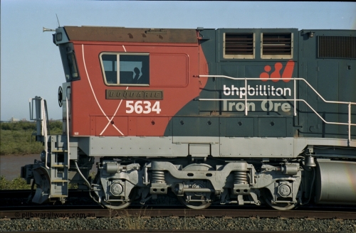 243-29
Nelson Point departure yard, BHP Billiton's CM40-8M unit 5634 'Boodarie' a Goninan WA GE rebuild unit serial 8151-07 / 91-120 in the new 'earth' or 'bubble' livery as it heads up an empty train waiting departure time. August 2003.
Keywords: 5634;Goninan;GE;CM40-8M;8151-07/91-120;rebuild;AE-Goodwin;ALCo;C636;5457;G6027-1;