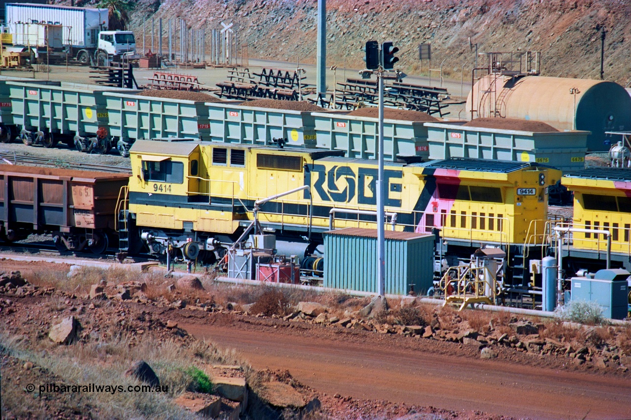 247-08
Cape Lambert fuel point, Robe River locomotive 9414 which is a Goninan WA ALCo to GE rebuild CM40-8M with serial 8206-11 / 91-124 from November 1991 riding on Dofasco bogies and was originally an AE Goodwin built M636 ALCo built new for Robe in December 1971 and numbered 262.005, later numbered 1714. Everything below the frame is ALCo while above is GE and Pilbara Cab. Approximate location of the locos is [url=https://goo.gl/maps/DEynwwkV9PZra5Gm7]here[/url]. 22nd May 2002.
Keywords: 9414;Goninan;GE;CM40-8M;8206-11/91-124;rebuild;AE-Goodwin;ALCo;M636;G6060-5;