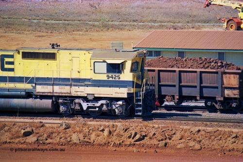247-28
Cape Lambert fuel point, Robe River Dash 8 power 9425 which is a Goninan WA ALCo to GE rebuild CM40-8M with serial 6266-8 / 89-85 from August 1989 riding on Hi-Ad bogies and was originally an AE Goodwin built M636 ALCo serial C-6041-4 and built new for Mt Newman Mining (later BHP Iron Ore) in April 1970 and numbered 5468, sold to Robe and delivered by road 17th August 1982. Everything below the frame is ALCo while above is GE and Pilbara Cab. Approximate location of the locos is [url=https://goo.gl/maps/DEynwwkV9PZra5Gm7]here[/url]. 22nd May 2002.
Keywords: 9425;Goninan;GE;CM40-8M;6266-8/89-85;rebuild;AE-Goodwin;ALCo;M636;G-6041-4;