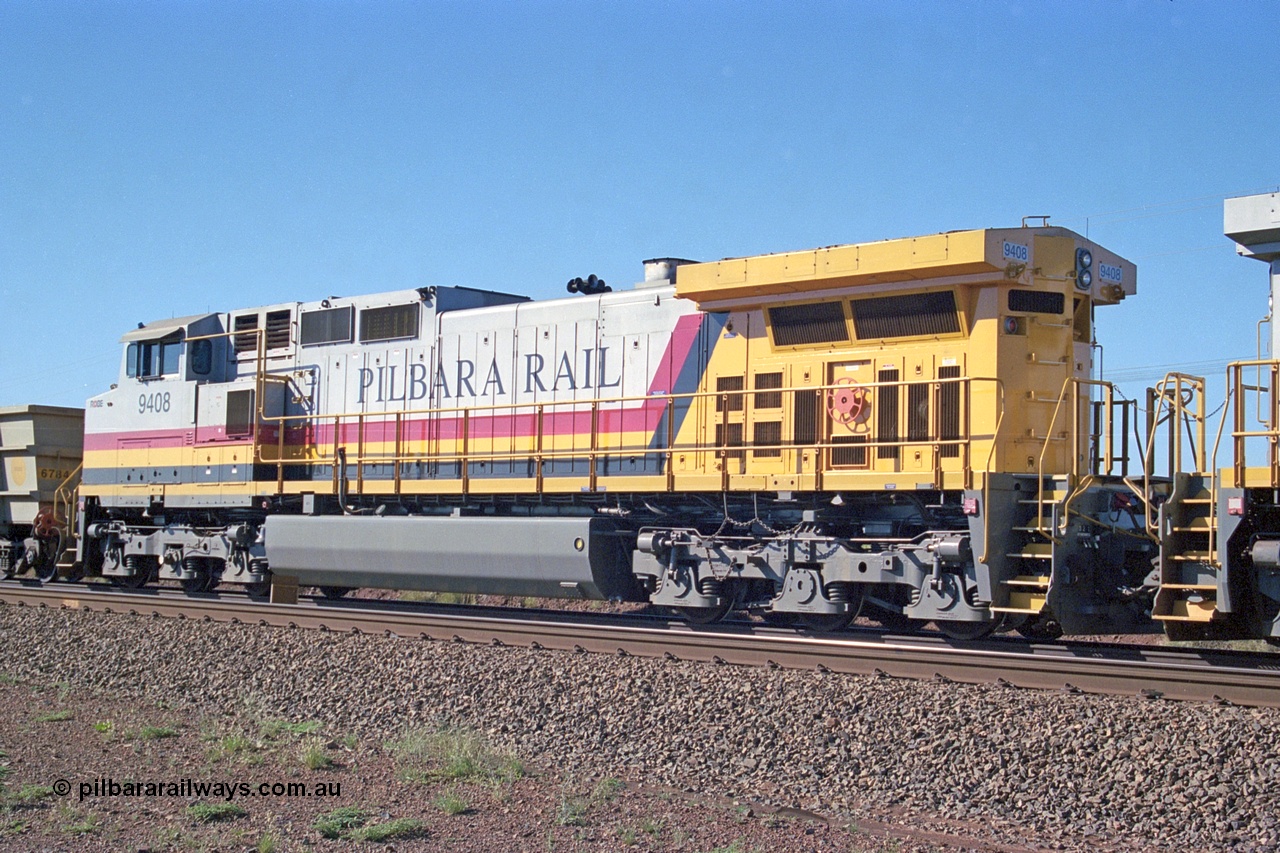 248-04
Dingo Siding on the Hamersley Iron railway at the 39 km with an empty train headed up by a pair of General Electric built Dash 9-44CW units 9408 serial 54158 from the fourth order in 2003 wearing the Pilbara Rail livery with Robe ownership markings. Approximate [url=https://goo.gl/maps/Jv752bD5KXv28oUV7]location[/url]. 24th April 2004.
Keywords: 9408;GE;Dash-9-44CW;54158;