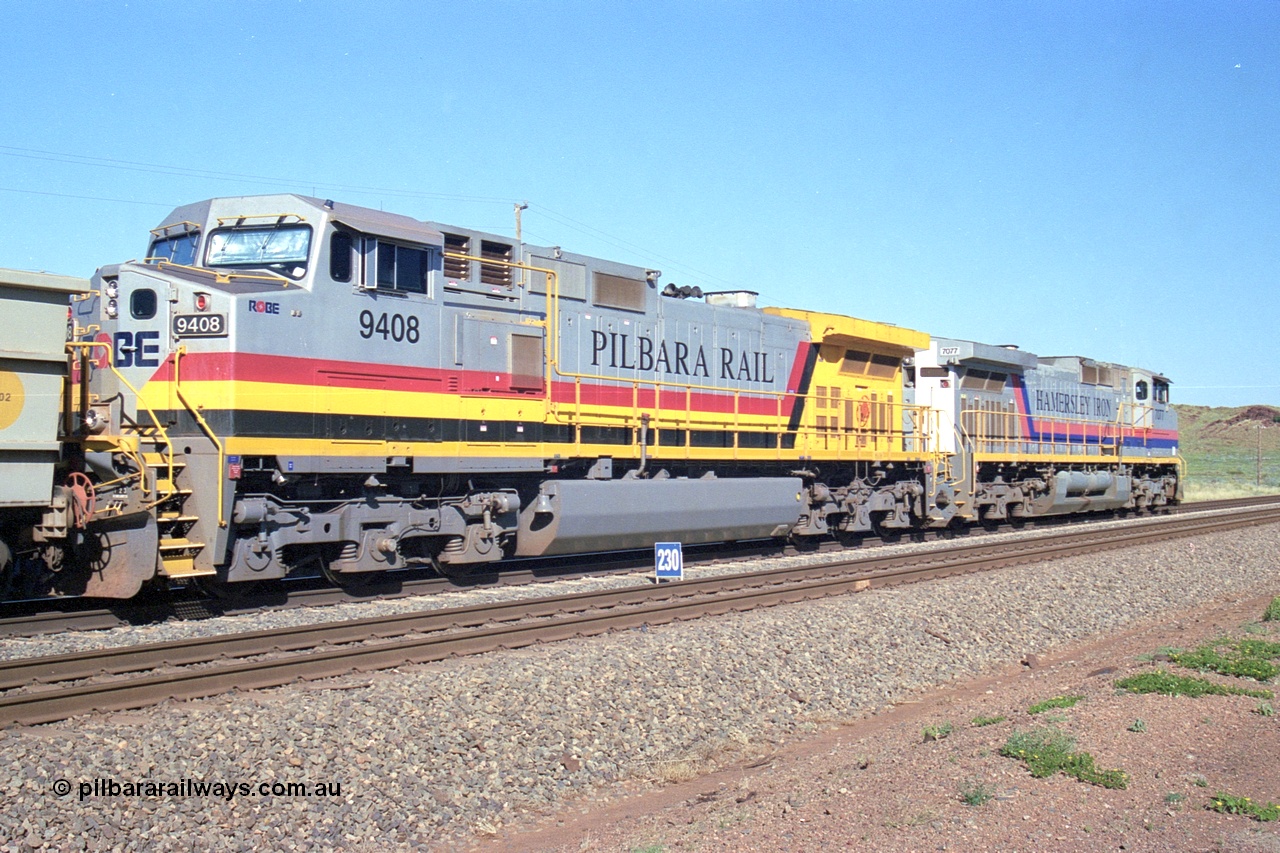 248-11
Dingo Siding on the Hamersley Iron railway at the 39 km with an empty train headed up by a pair of General Electric built Dash 9-44CW units 7077 serial 47756 from the original first order in the Pepsi Can livery and 9408 serial 54158 from the fourth order in the Pilbara Rail livery with Robe ownership markings. Approximate [url=https://goo.gl/maps/Jv752bD5KXv28oUV7]location[/url]. 24th April 2004.
Keywords: 9408;GE;Dash-9-44CW;54158;