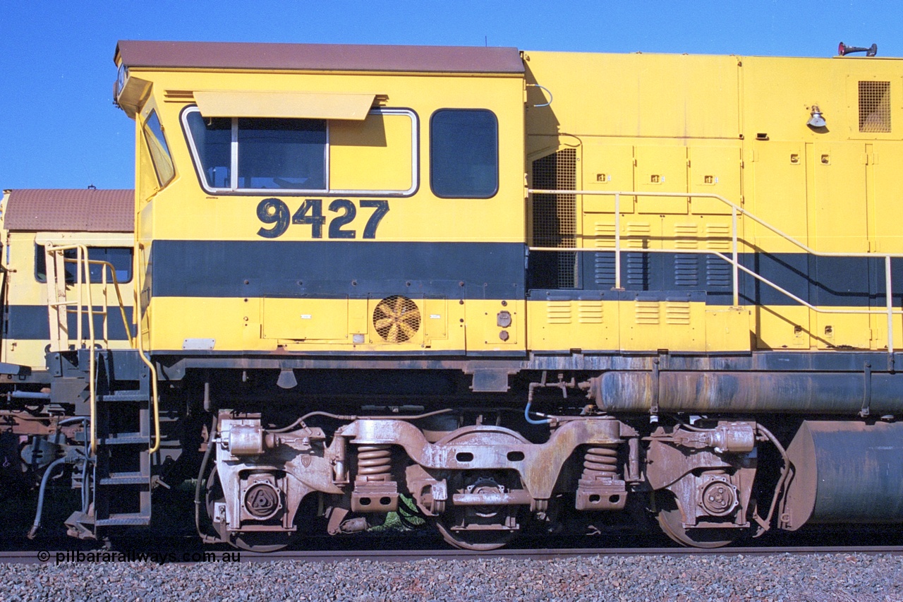 248-23
Seven Mile yard, stored Robe River ALCo locomotives at the south end of the Hamersley Iron Seven Mile yard on roads N2 and N3. On road N2 is 9427 a Comeng WA C636R rebuild from ALCo Schenectady NY model C636 serial 3499-2 originally built in January 1968 for Pennsylvania Railroad as #6331, Penn Central 6331 and finally Conrail 6781. Purchased in 1986 and rebuilt by Comeng WA into C636R before delivery to Robe in January 1987. This loco also went on to become DR 8403 for construction of FMG's railway in 2007-08. Approximate [url=https://goo.gl/maps/CXwAreRPb2RymQ9m9]location[/url]. 24th April 2004.
Keywords: 9427;Comeng-WA;C636R;WA143-2;rebuild;ALCo;Schenectady-NY;C636;Conrail;6781;3499-2;